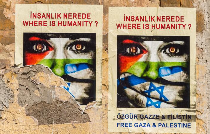 Posters on a street wall, Istanbul, Turkey, urge for a free Gaza and Palestine