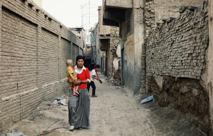 Young uighur mother with child in Kashgar, China