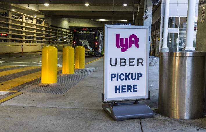 Ride sharing companies Lyft and Uber pickup spot at the airport