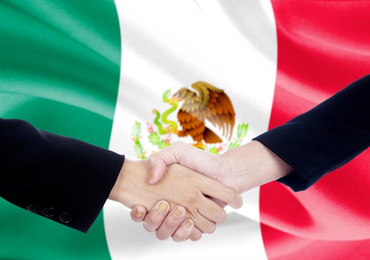 Handshake with Mexico flag 