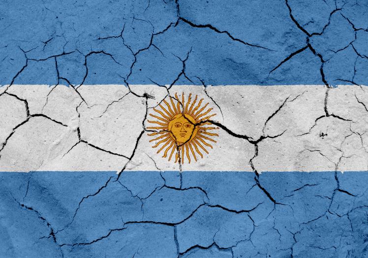 Argentina flag, with dried soil texture