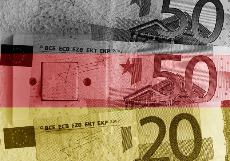 Euro banknotes, switch and Germany flag