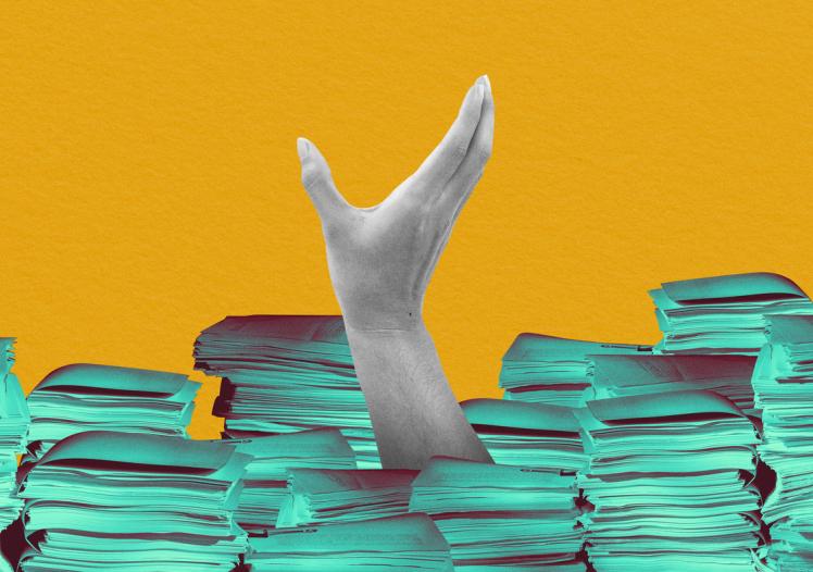 Person buried in paperwork