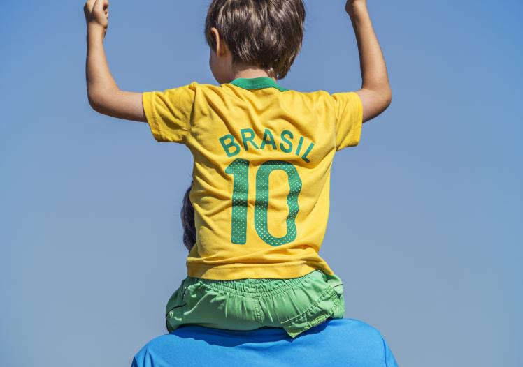 Father with cheering son