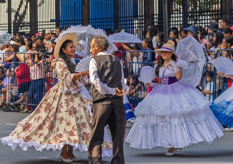 Parade with traditional colonial costumes in Guayaquil 