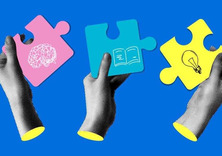 Hands holding a pieces of jigsaw 