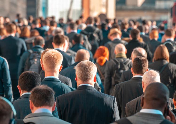 Commuters crossing crowded London Bridge
