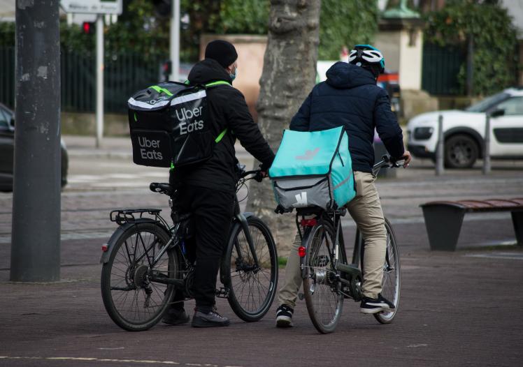 Deliveroo and Uber Eats cyclists