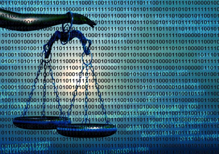 Binary code and scales of justice