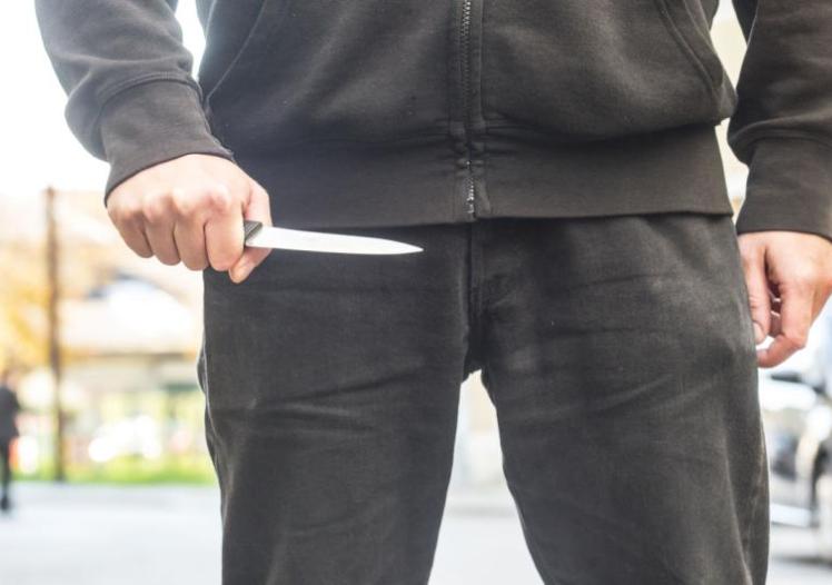 Man holding a knife