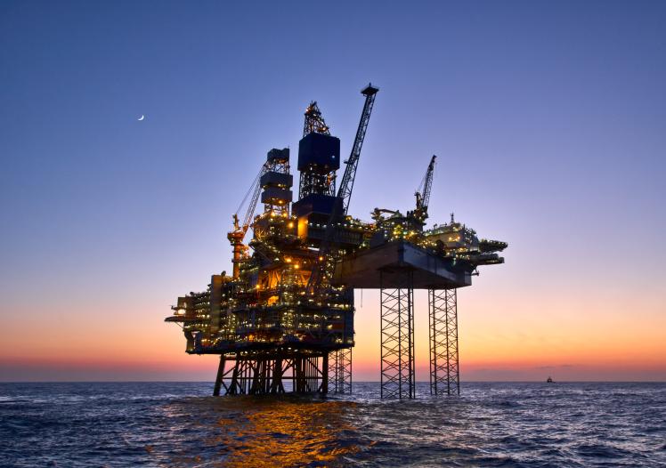 Offshore oil and gas platform on production site