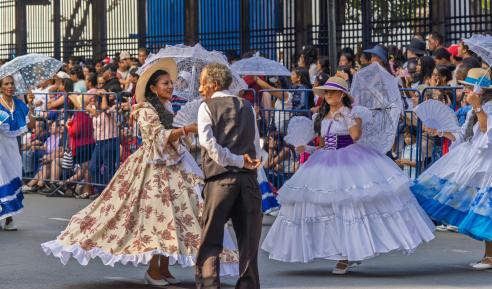 Parade with traditional colonial costumes in Guayaquil 
