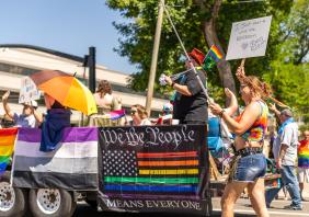 "We the People MEANS EVERYONE" rainbow sign/flag