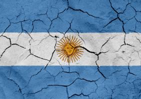 Argentina flag, with dried soil texture