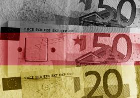 Euro banknotes, switch and Germany flag