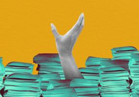 Person buried in paperwork