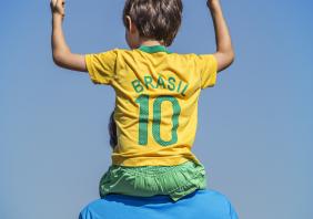 Father with cheering son
