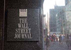 he Wall Street Journal sign