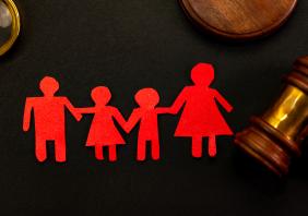 Paper chain family next to gavel