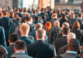 Commuters crossing crowded London Bridge