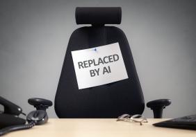 Empty office chair with replaced by AI sign