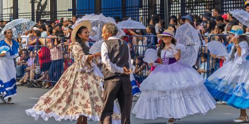 Parade with traditional colonial costumes in Guayaquil 