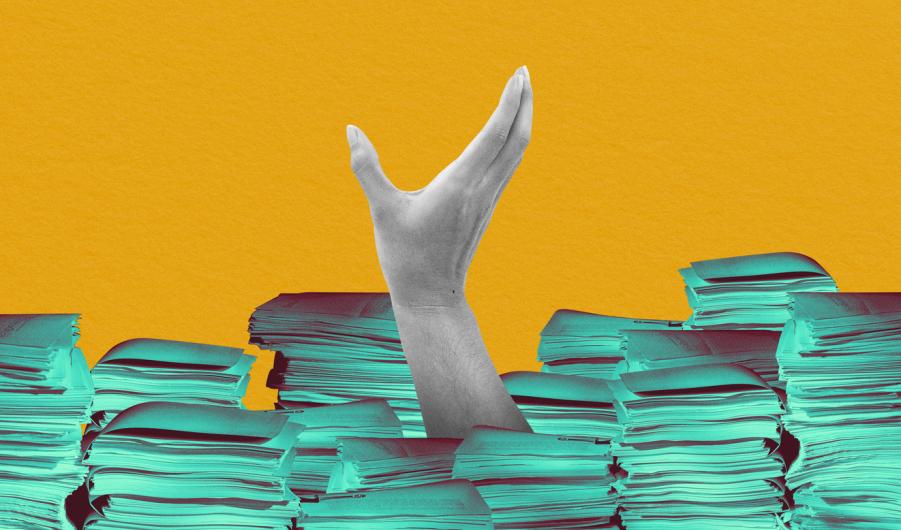 Person buried in paperwork