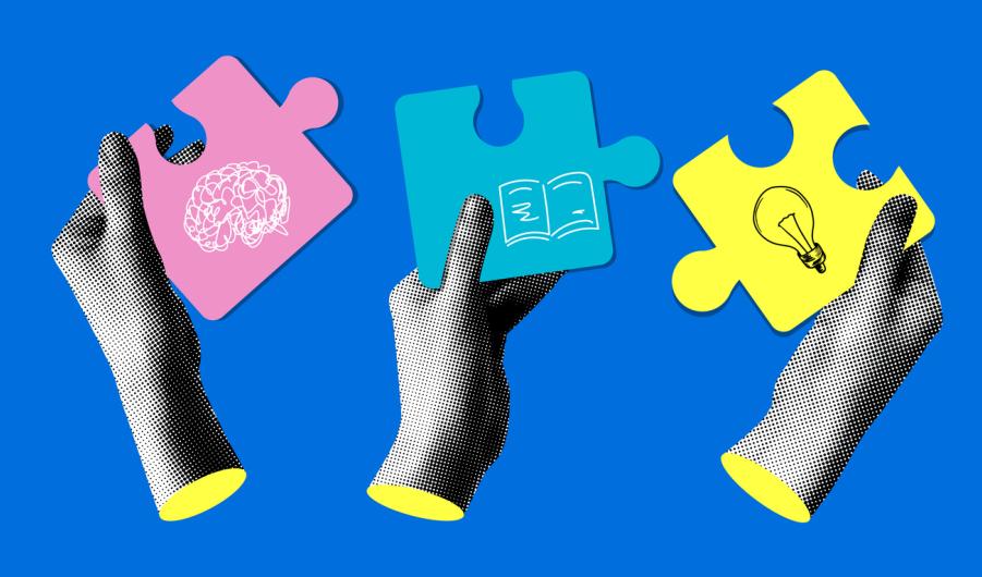 Hands holding a pieces of jigsaw 