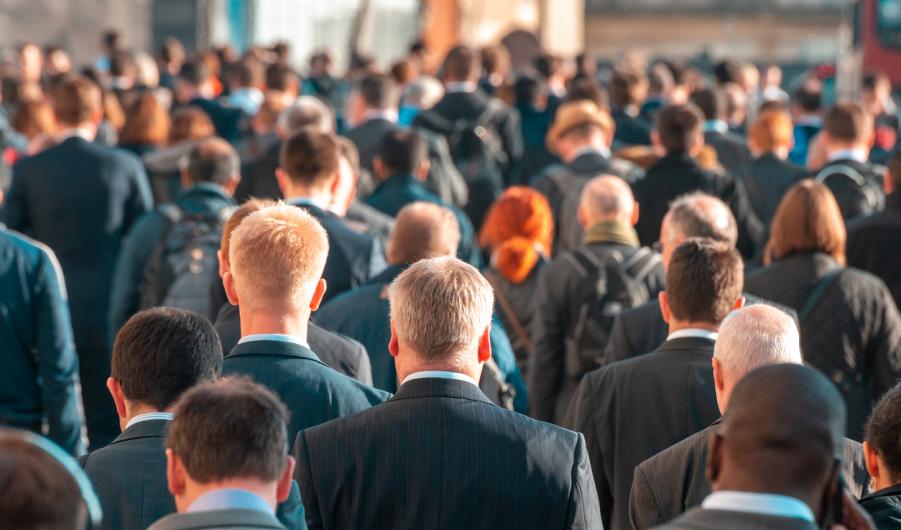 Commuters crossing crowded London Bridge